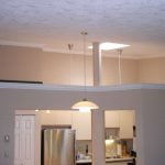 Interior painting and crown molding installation.