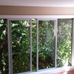 Large vinyl window installation..